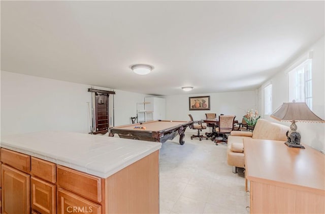 playroom with billiards table