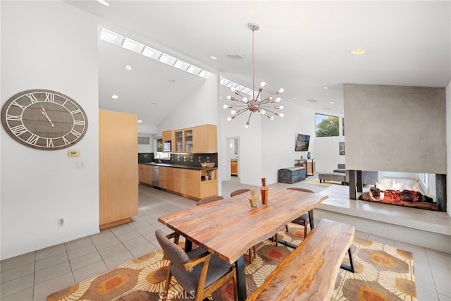 1601 Kent Ln, Newport Beach, CA 92660 - dining space featuring light tile patterned floors, recessed lighting, a chandelier, and high vaulted ceiling