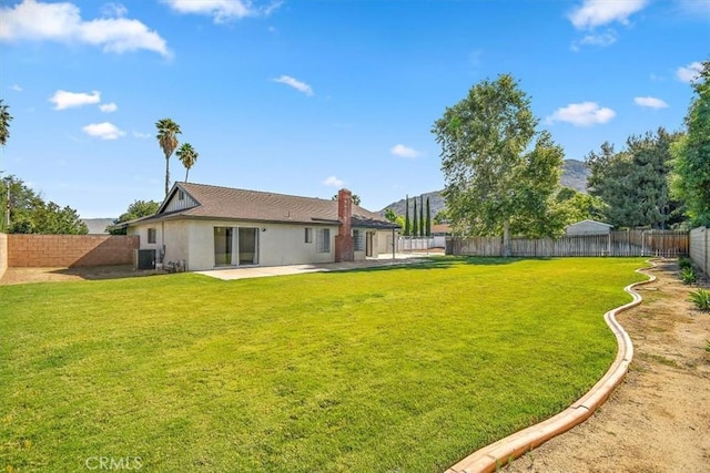 168 Radford Ct, Riverside, CA 92507 - view of yard featuring a patio and central AC unit