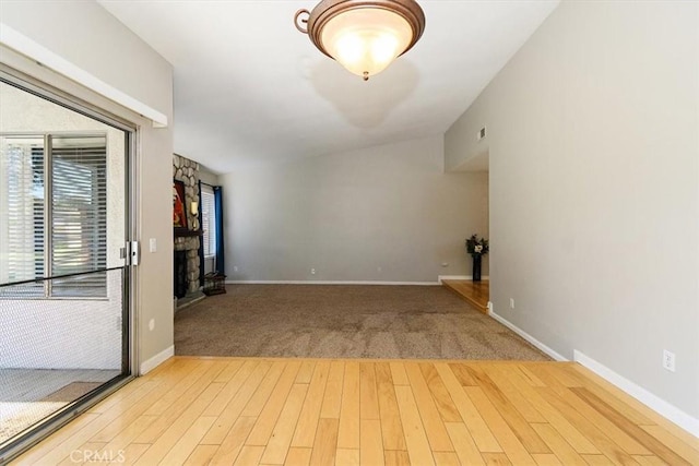 168 Radford Ct, Riverside, CA 92507 - unfurnished room featuring wood finished floors, a fireplace, and baseboards