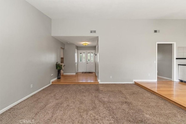 168 Radford Ct, Riverside, CA 92507 - unfurnished living room featuring baseboards and carpet flooring
