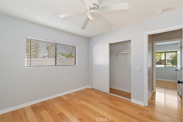 168 Radford Ct, Riverside, CA 92507 - unfurnished bedroom featuring light wood-style floors, a closet, baseboards, and ceiling fan