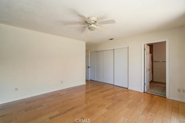 168 Radford Ct, Riverside, CA 92507 - unfurnished bedroom with light wood-style flooring, a closet, baseboards, ceiling fan, and ensuite bathroom