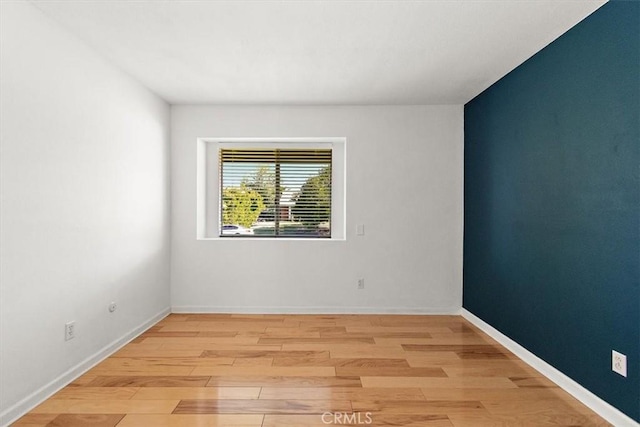 168 Radford Ct, Riverside, CA 92507 - spare room with light wood-type flooring and baseboards
