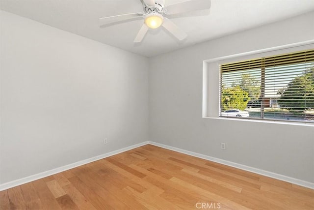168 Radford Ct, Riverside, CA 92507 - spare room with light wood finished floors, baseboards, and a ceiling fan