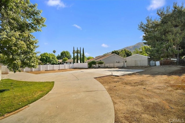 168 Radford Ct, Riverside, CA 92507 - view of yard featuring fence and a mountain view