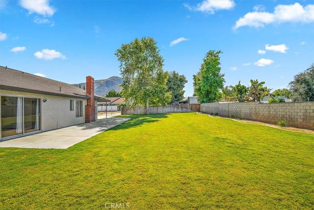 168 Radford Ct, Riverside, CA 92507 - view of yard featuring a patio area and a mountain view