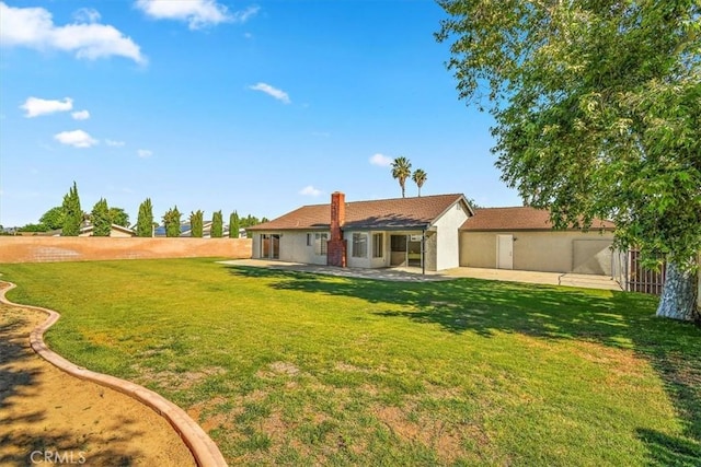 168 Radford Ct, Riverside, CA 92507 - rear view of property with a patio and a chimney