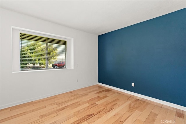 168 Radford Ct, Riverside, CA 92507 - spare room featuring wood finished floors and baseboards