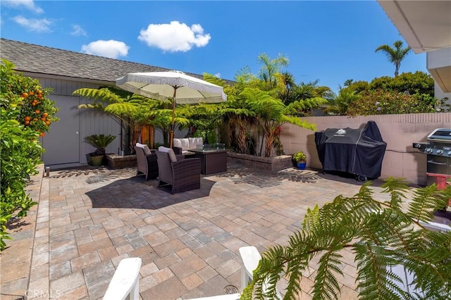 16422 Harbour Ln Unit 17, Huntington Beach, CA 92649 - view of patio / terrace with grilling area, fence, and an outdoor living space
