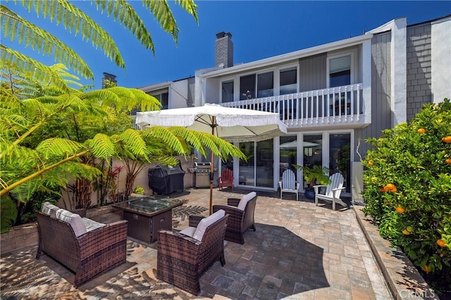 16422 Harbour Ln Unit 17, Huntington Beach, CA 92649 - view of patio with an outdoor living space and a balcony