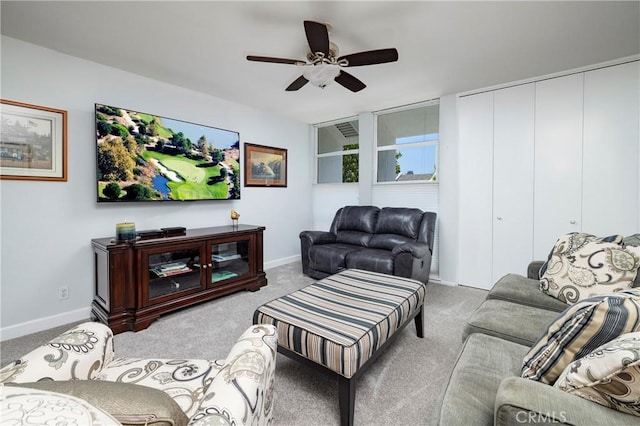16422 Harbour Ln Unit 17, Huntington Beach, CA 92649 - living room with a ceiling fan, carpet floors, and baseboards