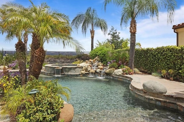 27086 Maple Tree Ct, Valencia, CA 91381 - view of swimming pool featuring a fenced backyard and a pool with connected hot tub