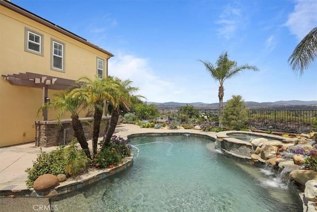 27086 Maple Tree Ct, Valencia, CA 91381 - view of pool with a mountain view, a pergola, a pool with connected hot tub, and fence