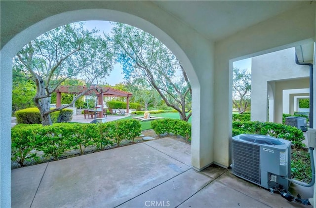 28220 Highridge Rd Unit 104, Rancho Palos Verdes, CA 90275 - view of patio featuring cooling unit and a pergola