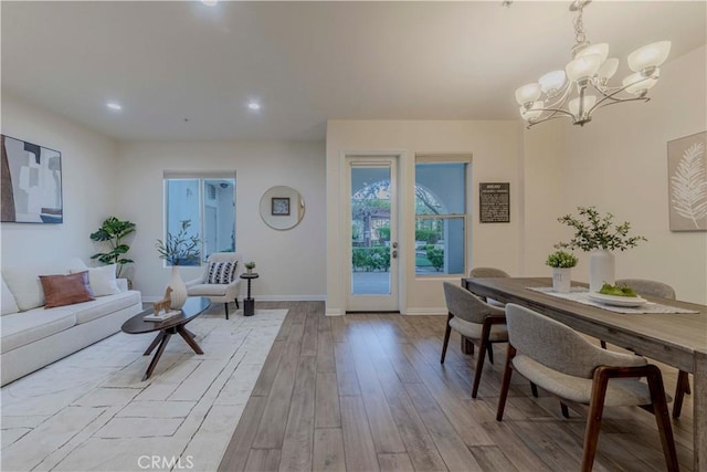 28220 Highridge Rd Unit 104, Rancho Palos Verdes, CA 90275 - living area with light wood-type flooring, a chandelier, baseboards, and recessed lighting