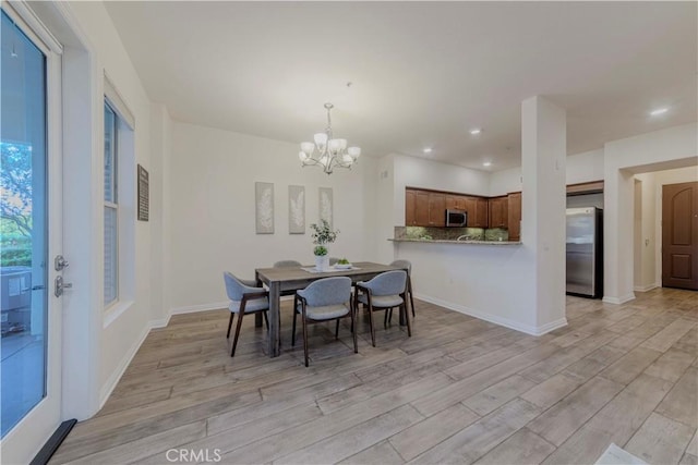 28220 Highridge Rd Unit 104, Rancho Palos Verdes, CA 90275 - dining space featuring a chandelier, light wood finished floors, recessed lighting, and baseboards