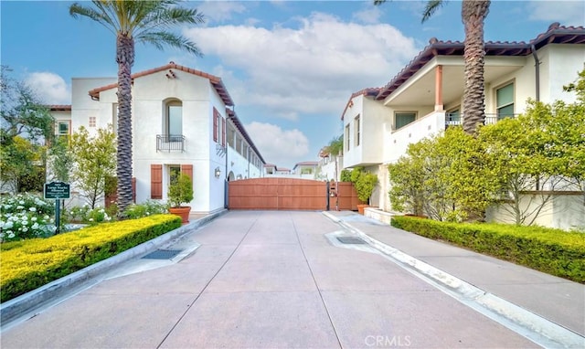 28220 Highridge Rd Unit 104, Rancho Palos Verdes, CA 90275 - view of road featuring a gate and curbs