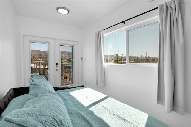 72473 Desert Trail Dr Unit 29, Palms, CA 92277 - bedroom with french doors and access to outside