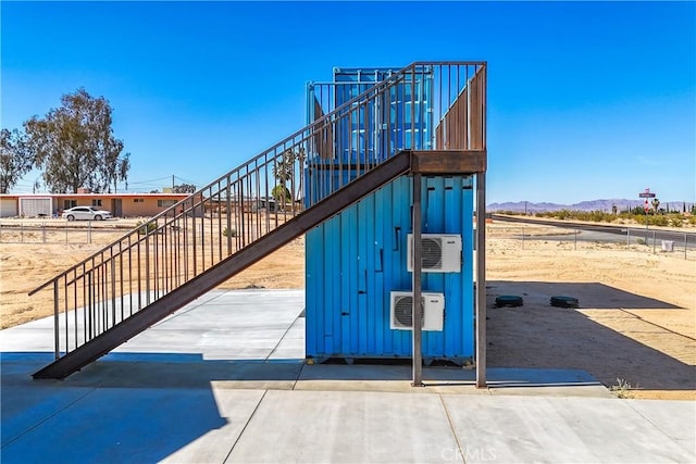 72473 Desert Trail Dr Unit 29, Palms, CA 92277 - view of playground with a mountain view and stairway