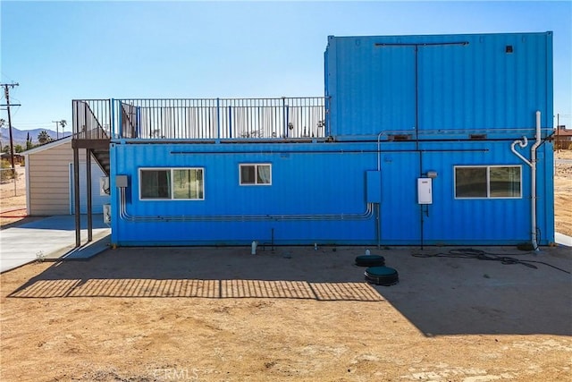 72473 Desert Trail Dr Unit 29, Palms, CA 92277 - view of building exterior with a mountain view