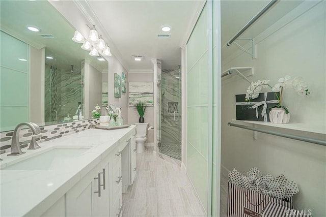 3365 Punta Alta Unit 3C, Laguna Woods, CA 92637 - bathroom featuring a marble finish shower, toilet, vanity, and ornamental molding