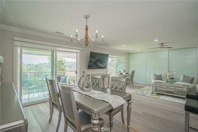 3365 Punta Alta Unit 3C, Laguna Woods, CA 92637 - dining room with crown molding, a chandelier, light wood-style flooring, and recessed lighting