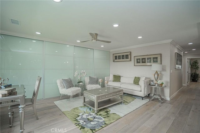 3365 Punta Alta Unit 3C, Laguna Woods, CA 92637 - living room featuring crown molding, ceiling fan, wood finished floors, recessed lighting, and baseboards