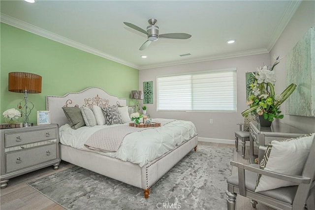 3365 Punta Alta Unit 3C, Laguna Woods, CA 92637 - bedroom with crown molding, wood finished floors, recessed lighting, baseboards, and ceiling fan