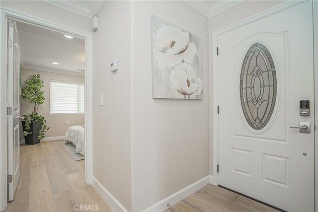 3365 Punta Alta Unit 3C, Laguna Woods, CA 92637 - entryway featuring ornamental molding, light wood-style flooring, baseboards, and recessed lighting