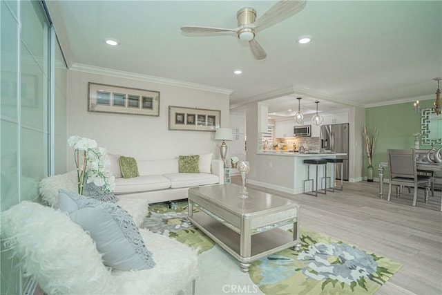 3365 Punta Alta Unit 3C, Laguna Woods, CA 92637 - living area featuring ornamental molding, a ceiling fan, recessed lighting, a chandelier, and baseboards