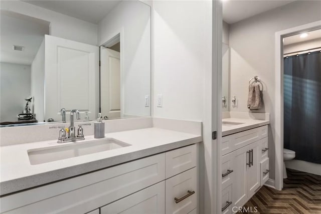16073 Narni Ln, Fontana, CA 92336 - full bath featuring vanity, toilet, and a shower with curtain