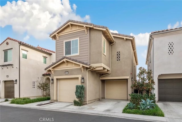 16073 Narni Ln, Fontana, CA 92336 - view of front of house featuring stucco siding, an attached garage, and a tile roof