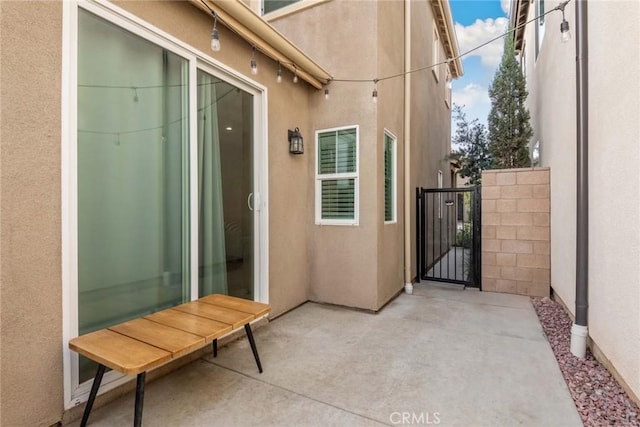 16073 Narni Ln, Fontana, CA 92336 - view of patio / terrace featuring a gate