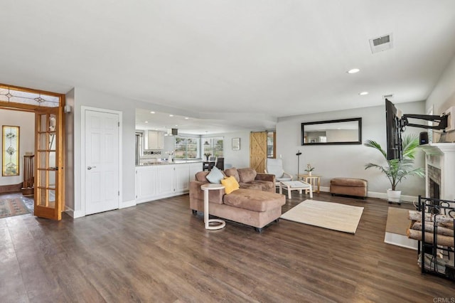 3631 Alta Vista Dr, Fallbrook, CA 92028 - living area with dark wood-style flooring, a fireplace, baseboards, recessed lighting, and french doors