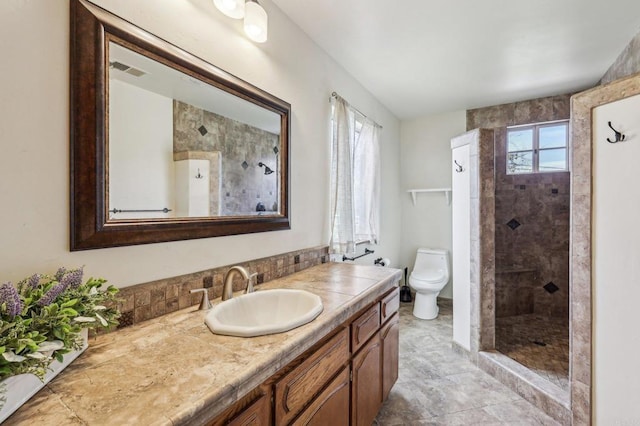3631 Alta Vista Dr, Fallbrook, CA 92028 - bathroom with a tile shower, vanity, and toilet