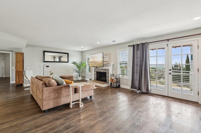 3631 Alta Vista Dr, Fallbrook, CA 92028 - living room with dark wood-style flooring, recessed lighting, a fireplace, baseboards, and french doors