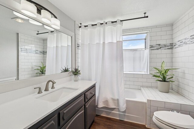 3631 Alta Vista Dr, Fallbrook, CA 92028 - bathroom featuring wood finished floors, vanity, toilet, and shower / tub combo with curtain
