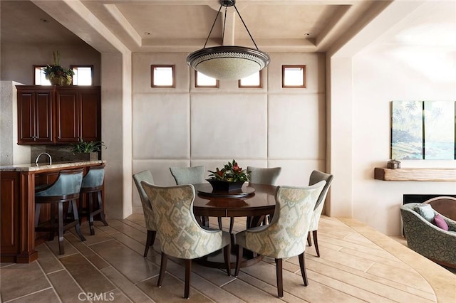 1131 Dolphin Ter, Corona Del Mar, CA 92625 - dining room featuring a raised ceiling
