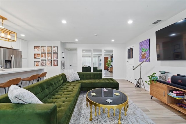 1343 Cordon Dr, City Terrace, CA 90063 - living room featuring light wood finished floors and recessed lighting