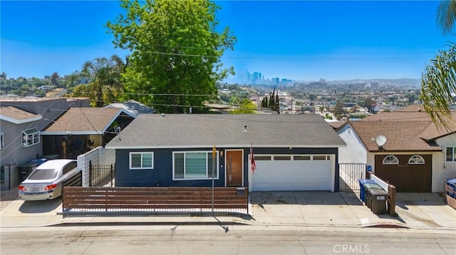 1343 Cordon Dr, City Terrace, CA 90063 - ranch-style house featuring driveway, an attached garage, and a shingled roof
