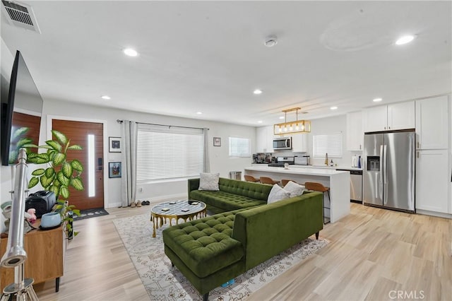 1343 Cordon Dr, City Terrace, CA 90063 - living room featuring recessed lighting and light wood-style floors
