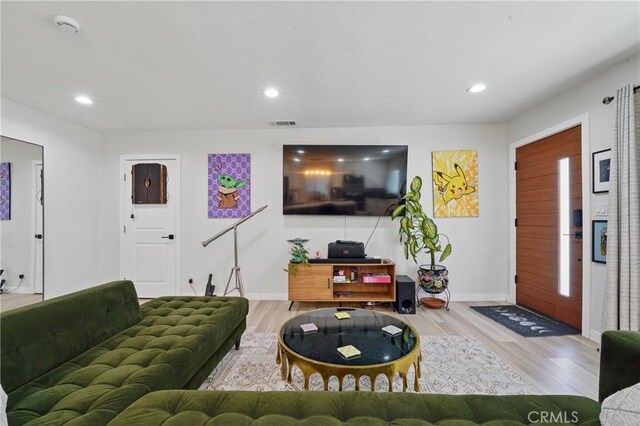 1343 Cordon Dr, City Terrace, CA 90063 - living area featuring wood finished floors and recessed lighting