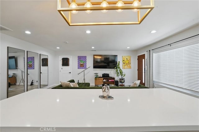 1343 Cordon Dr, City Terrace, CA 90063 - kitchen with recessed lighting, a kitchen island, decorative light fixtures, and open floor plan