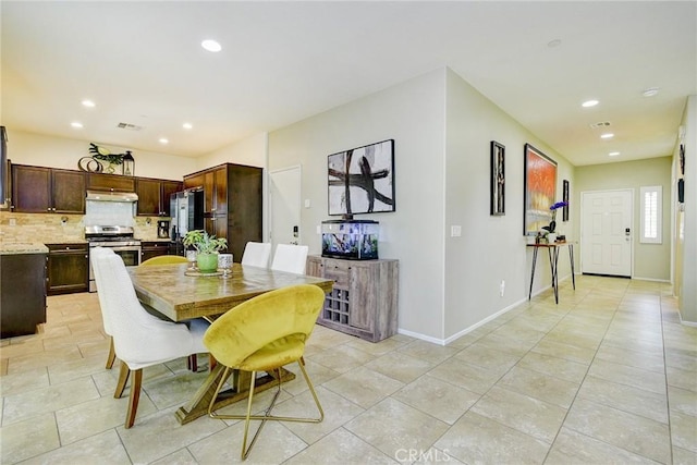 16759 Yellow Fern Ln, Fontana, CA 92336 - dining room featuring recessed lighting, baseboards, and light tile patterned floors