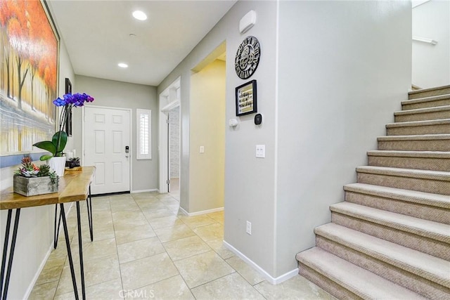 16759 Yellow Fern Ln, Fontana, CA 92336 - foyer with stairway, recessed lighting, light tile patterned floors, and baseboards