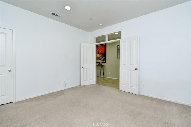 16759 Yellow Fern Ln, Fontana, CA 92336 - unfurnished bedroom with light carpet and baseboards