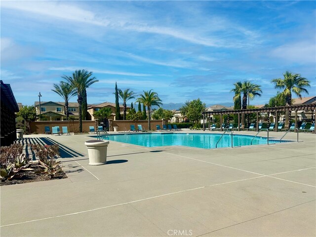 16759 Yellow Fern Ln, Fontana, CA 92336 - community pool featuring a patio area