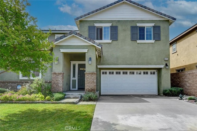 16759 Yellow Fern Ln, Fontana, CA 92336 - view of front facade with driveway, a garage, stucco siding, and a tile roof