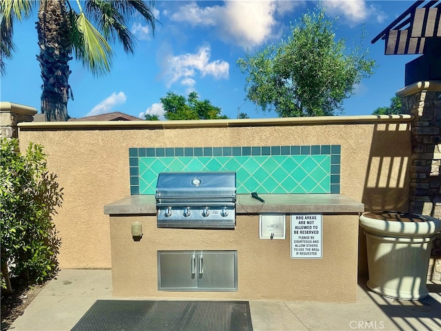 16759 Yellow Fern Ln, Fontana, CA 92336 - view of patio featuring a grill and area for grilling
